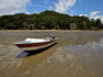Boat beached on the mud at low tide.