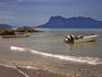 Boat anchored at the beach.