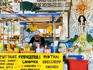 Food and drink stall against mural backdrop.