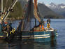Fishing boat catching salmon in Valdez Arm inlet.