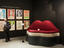 Paintings and sofa on exhibit at Espace Dali museum.