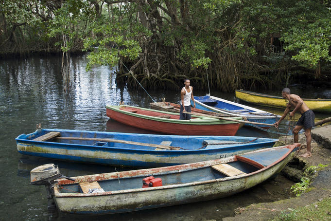 Men preparing for fishing trip in Laguna Gri-Gri.