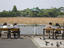 People on park benches with Benten-Do temple in background, Ueno Koen.