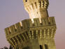 Tower of Almudaina Palace at dusk.