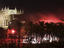 Firedancers at Noche de San Juan celebration in Parc de la Mar and La Seu Palma Cathedral.