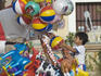 Boy and balloons at Plaza Mijares.
