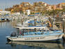 Marina with moored boats from the Malecon.
