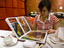 Young woman looking through the menu at Shanghai Uncle restaurant.