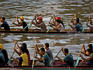 Sarawak Regatta boats racing each other.