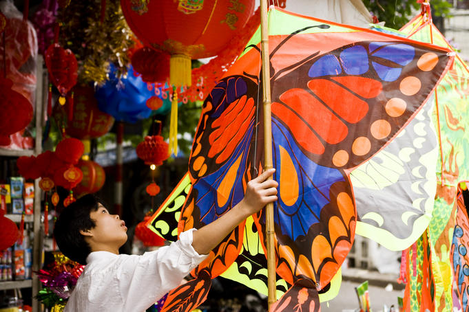 Boy in a kite shop, Old Quarter.