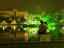 Couple hugging by Hoan Kiem Lake at night, Old Quarter.