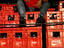 Coke dude: a man sitting on crates of Coca-Cola