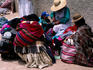 Campesinas, peasant women, sitting on the street in their colourful clothes