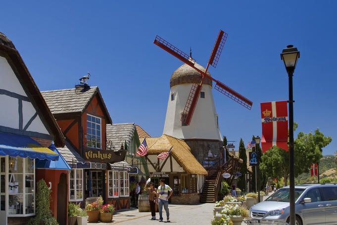 Windmill imitation and shops along Alisol Road in Danish Village.