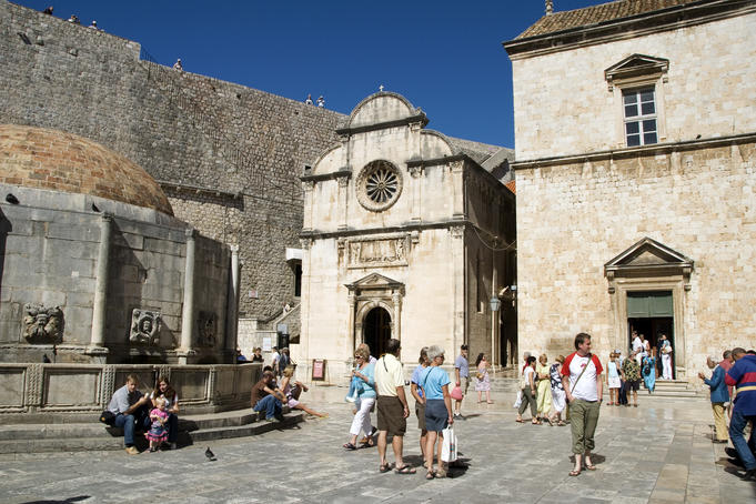 St Saviour Church and Onofrio Fountain with old city wall behind.