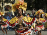 Costumed dancers performing in the Carnival parade.