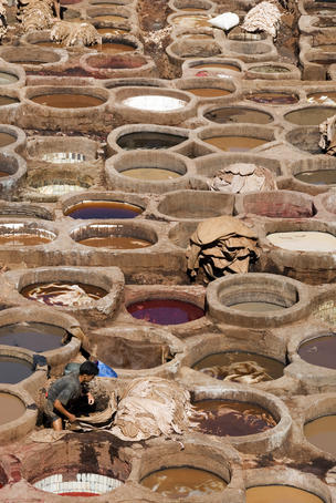 Dyeing pits at Chouara leather tannery.