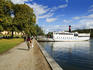 Boat arriving at Drottningholm Palace, private residence of the Swedish Royal Family, from Lake Malaren.