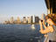 Tourist taking photo of Manhattan from the Staten Island Ferry.
