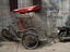 Cyclo parked on a Hanoi street.