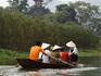 Passenger-laden row boat on the Yen River, en route to Perfume Pagoda (Chua Huong) complex.