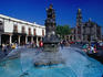 The fountain and Iglesio de Santo Domingo in the plaza of the same name in Mexico City