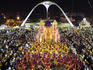 Beija Flor Samba School float during Carnival parade at the Sambodrome. The bird-shaped Sambodrome icon determines where the parade ends.