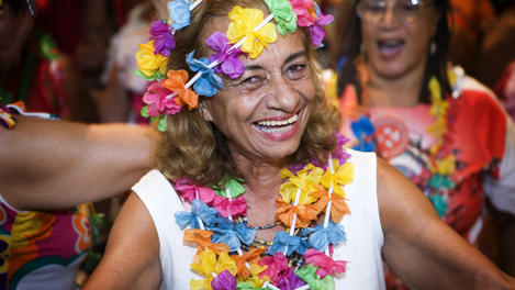 Portrait of an energetic elderly Carnival participant, Copacabana.