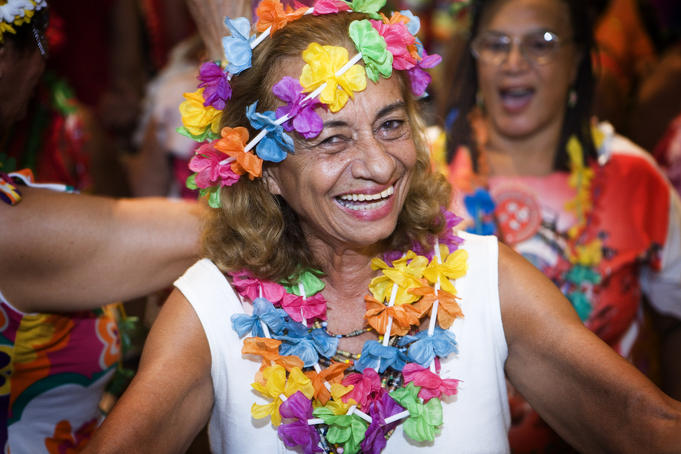 Portrait of an energetic elderly Carnival participant, Copacabana.