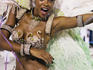 Woman (mulata) dancing for Grande Rio Samba School, at the Sambodrome Carnival parade.