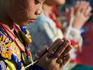 Boy praying at Wat Pa Pao temple during Poi Sang Long festival (for ordination of novice monks).