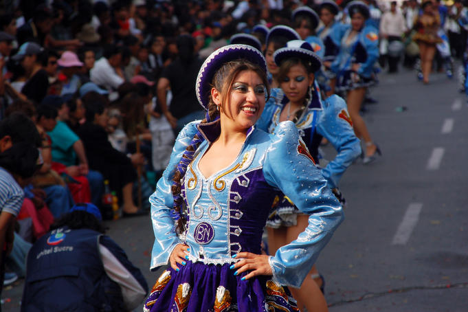 Costumed dancer celebrating Fiesta de la Virgen de Guadalupe.
