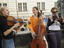 Girl folk band busking at Charles Bridge, Stare Mesto.