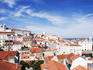 Rooftops across Alfama from the miradouro at Largo das Portas do Sol.
