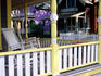 Gingerbread house verandah with rocking chairs, near Trinity Park.