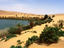 Mavo Lake, which is reknown for changing colour (blue, green... even red), rimmed with lucky vegetation in the Awbari Sand Sea