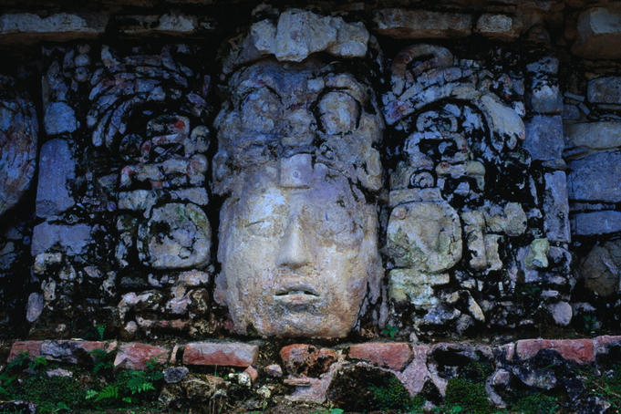 Stone sculpture at the El Palacio, where archeologists and astronomers believe that the tower was constructed so that Mayan royalty and the priest class could observe the sun falling directly into the Templo de los Inscripciones during the northern winter solstice - Palenque, Chiapas