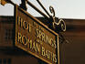 Sign pointing to Hot Springs and Roman Baths.