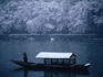 A traditional leisure boat during a snowfall at Arashiyama west of Kyoto.