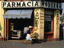 Pharmacy on a street corner at Plaza Hidalgo.