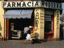 Pharmacy on a street corner at Plaza Hidalgo.