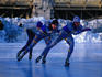 Three speed skaters warm up at City Park(named after Count Istvan Szechenyi), prior to international competition. The park is open in winter for public skating and rental boats are on offer during summer - Budapest.