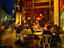 Eating on the street at night in a cafe in Pigalle - Paris, Ile-de-France
