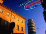 Leaning Tower of Pisa and city building.