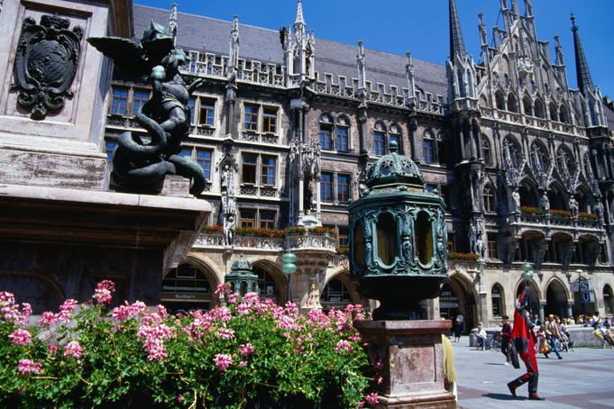 Statues, flowers and the New Town Hall, built in the neo-Gothic style