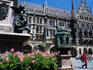 Statues, flowers and the New Town Hall, built in the neo-Gothic style