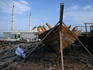 Shipyards with mosque behind.