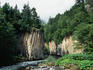 A river cuts through sheer rock cliffs in the Soun-kyo (gorge) in the Daisetsuzan National Park - Hokkaido