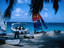 A dive boat heads out from Grand Cayman, for a decent dive site travellers need not go out further than 50 odd feet