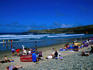 People crowd the beach on Whitesands Bay, Pembrokeshire Coast - Dyfed, Pembrokeshire, Wales